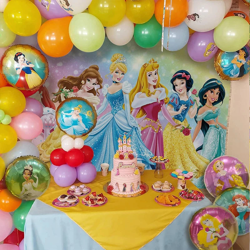 Disney princess-themed birthday party setup with balloons, cake, and decorations.