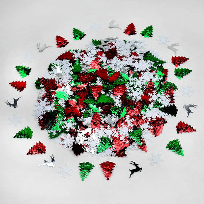 Colorful Christmas-themed confetti on a white background with small reindeer figures.