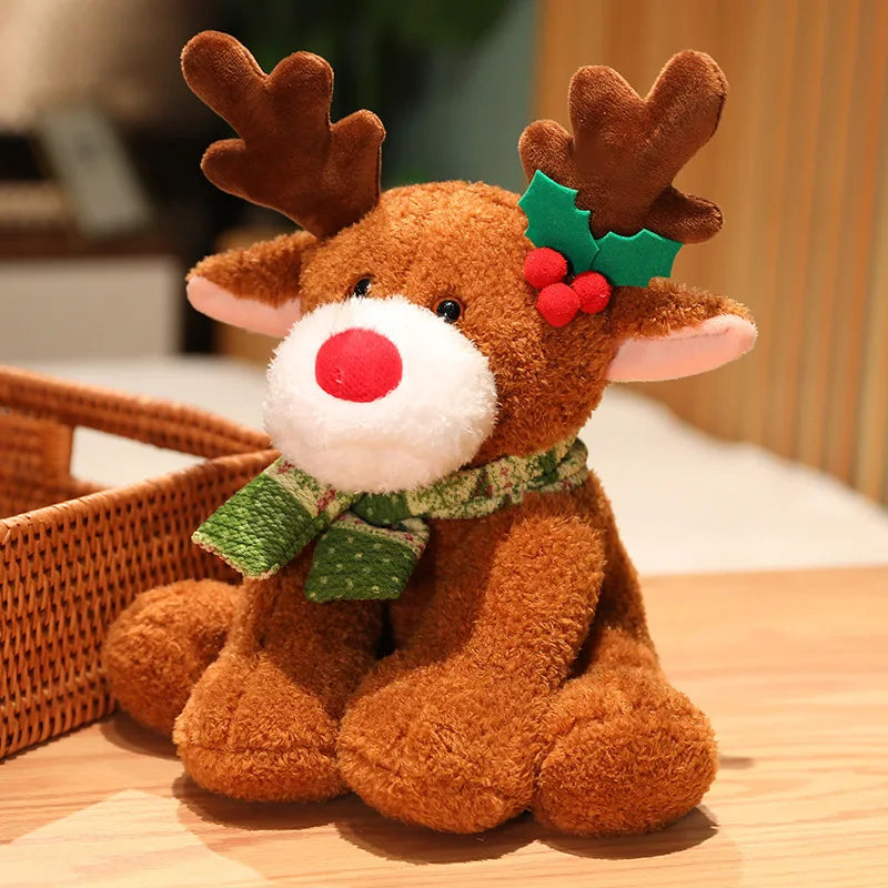 Plush reindeer toy with a green bow and holly leaves on a wooden surface.