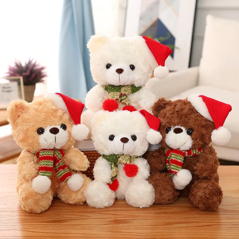 Three teddy bears wearing red Santa hats and scarves on a wooden surface.