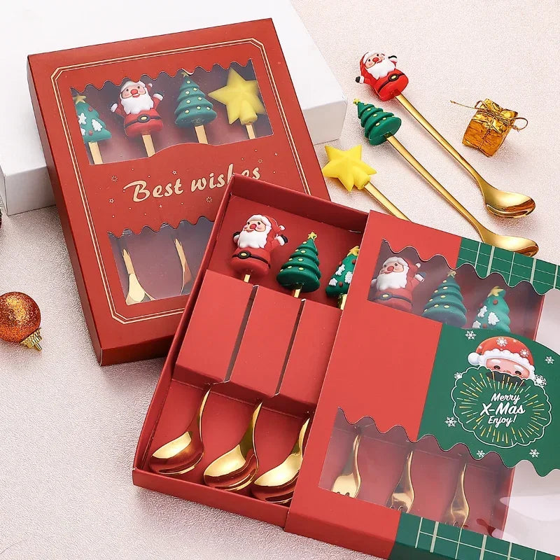 Set of Christmas-themed spoons in a decorative box with festive designs.