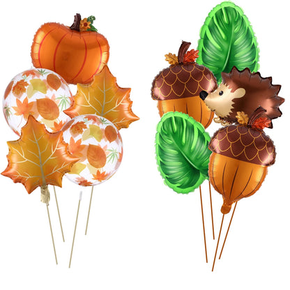 Set of autumn-themed balloons including pumpkins, leaves, and a hedgehog on sticks against a white background.