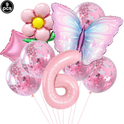 Set of pink balloons including a butterfly, flower, and number 6 on a white background