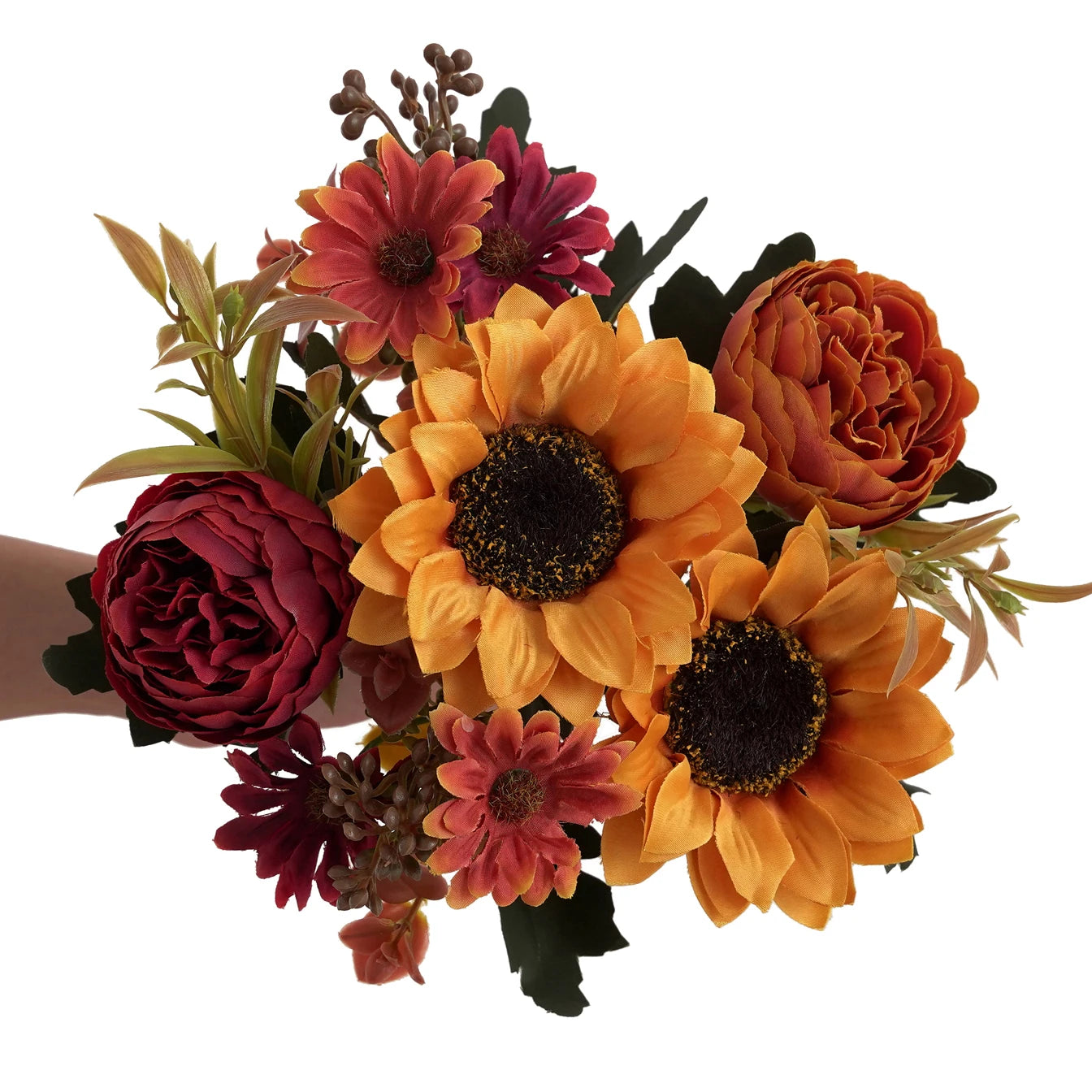 Bouquet of artificial flowers including sunflowers and roses on a white background