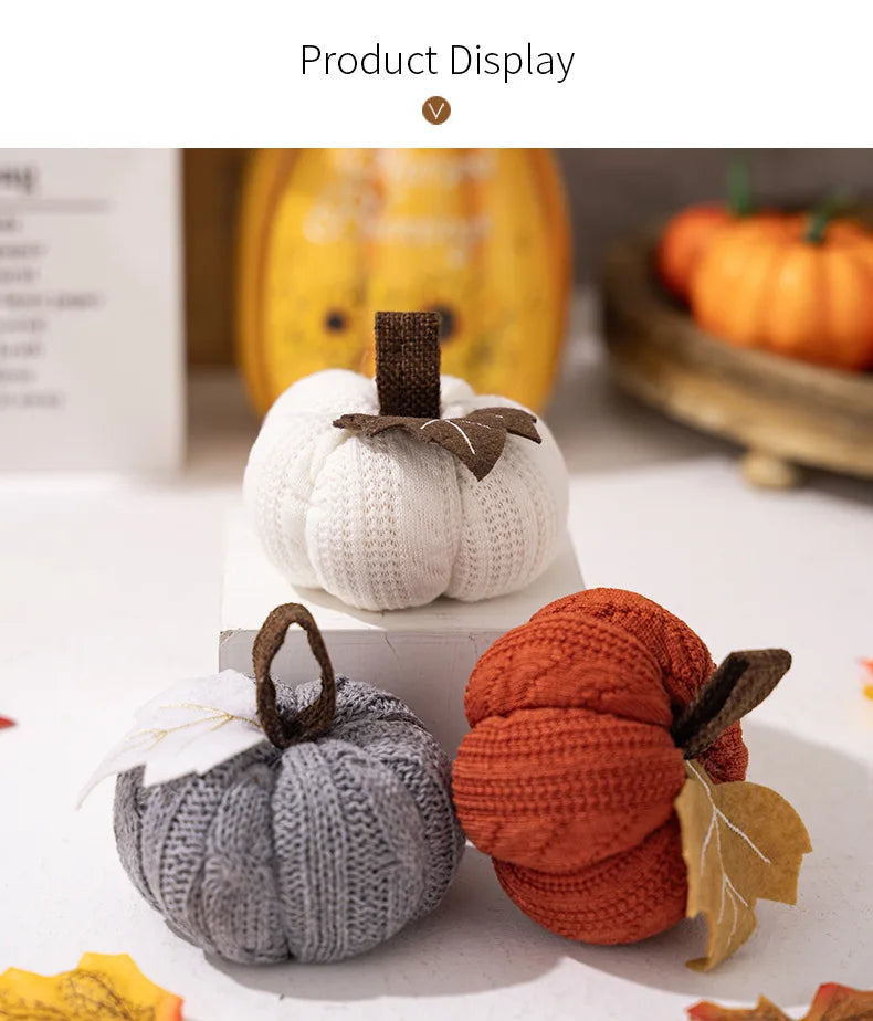 Knitted pumpkins in white, gray, and orange on a neutral background