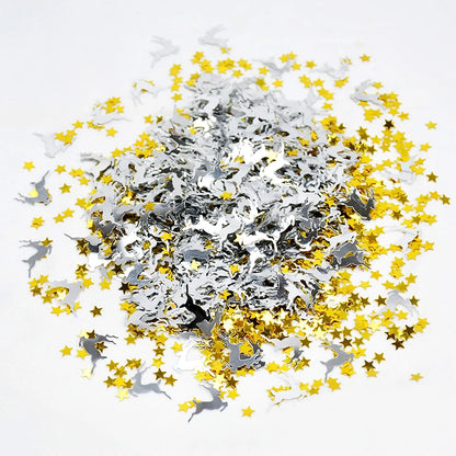 Confetti with silver reindeer and gold stars on a white background