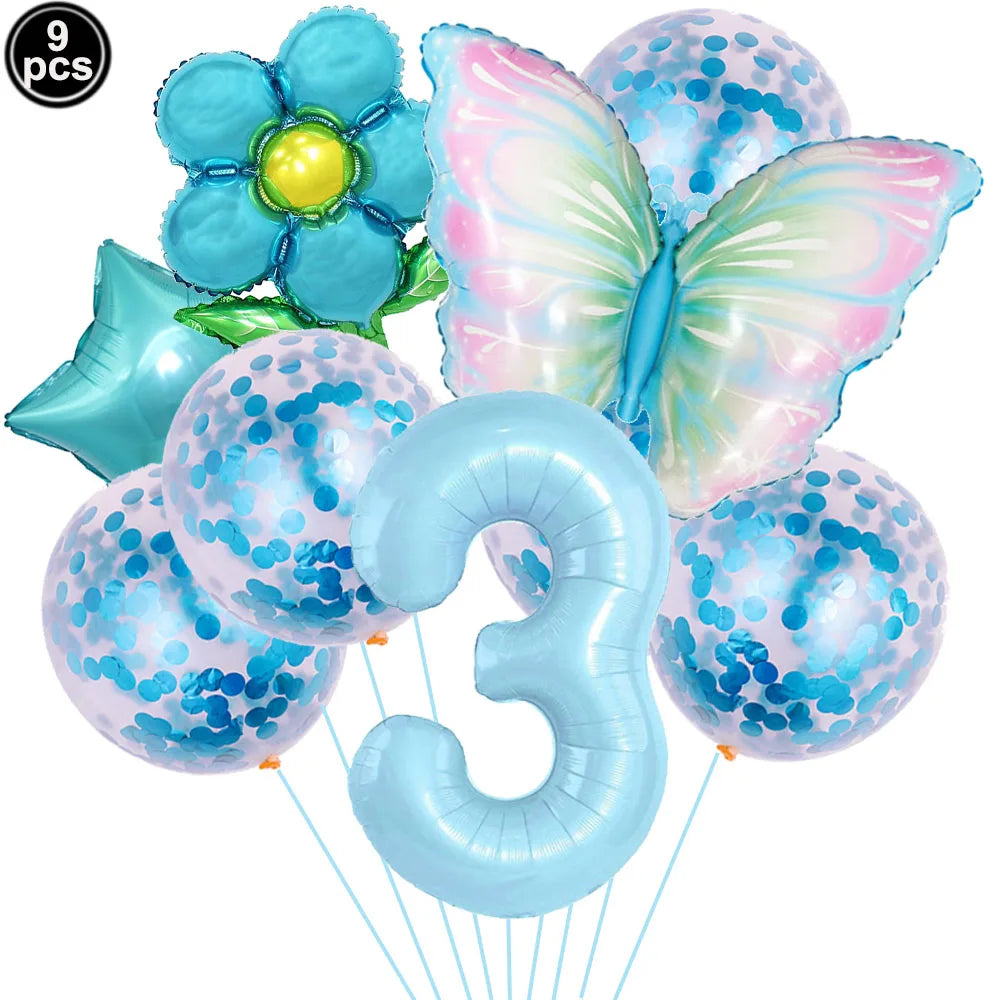 Set of colorful balloons including a number '3', butterfly, and flower design on a white background.