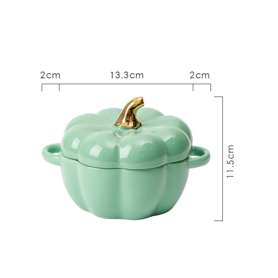 Green pumpkin-shaped container with a gold lid, shown with measurements on a white background.