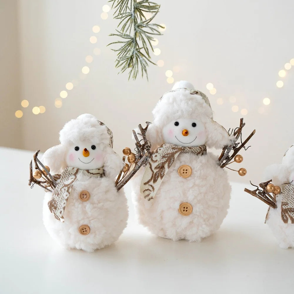 Two decorative snowmen with buttons and a bow tie against a softly blurred background with lights and greenery.