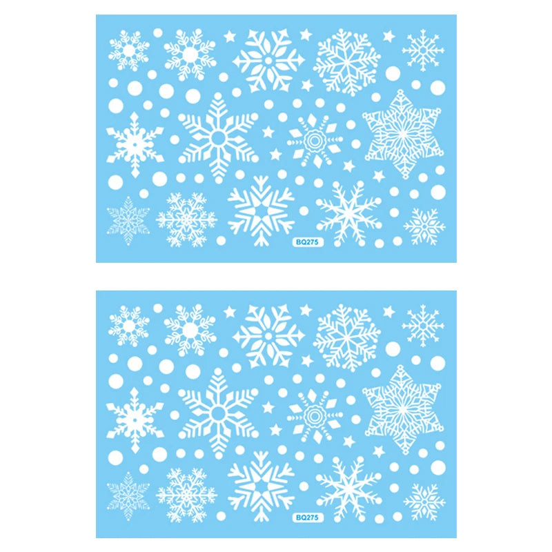 Two sheets of white snowflake stickers on a blue background