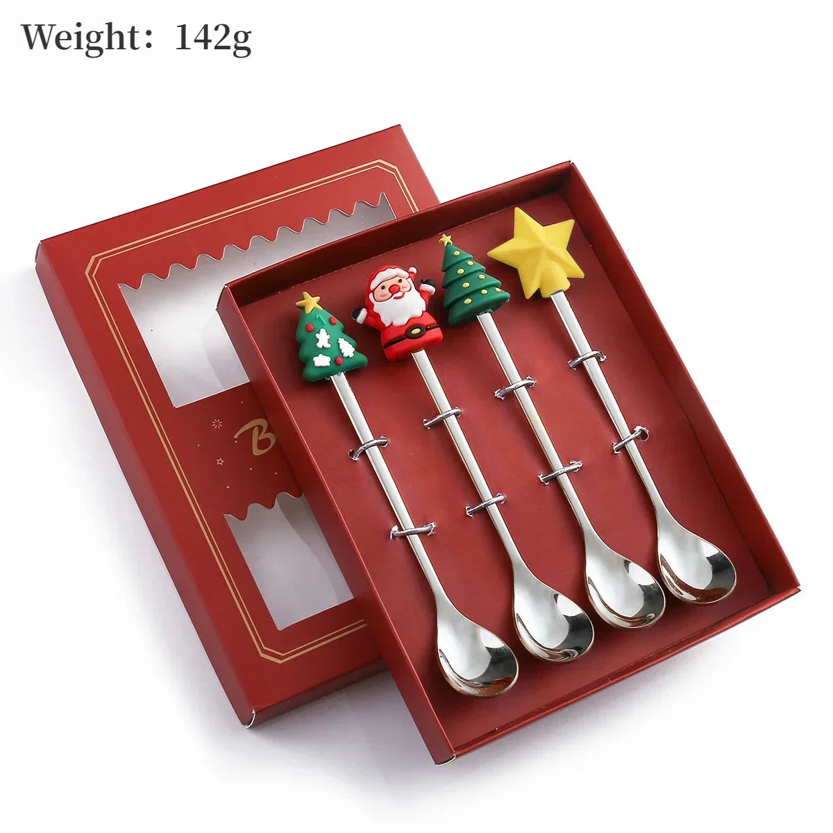 Set of four Christmas-themed spoons in a red box with a weight label.