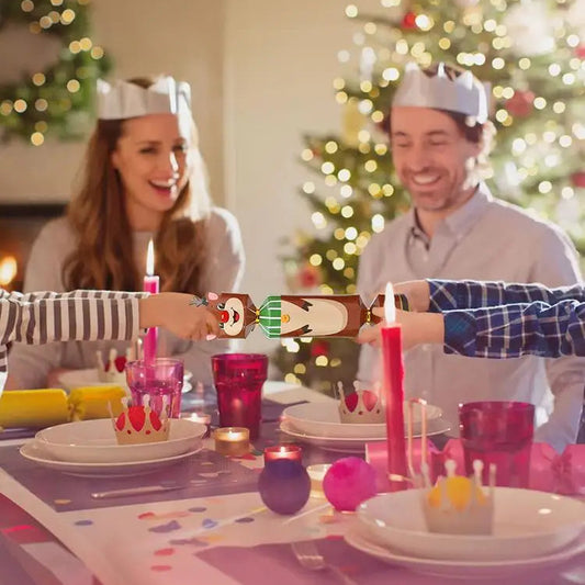 Two people at a Christmas dinner table with a bottle of wine, surrounded by festive decorations.