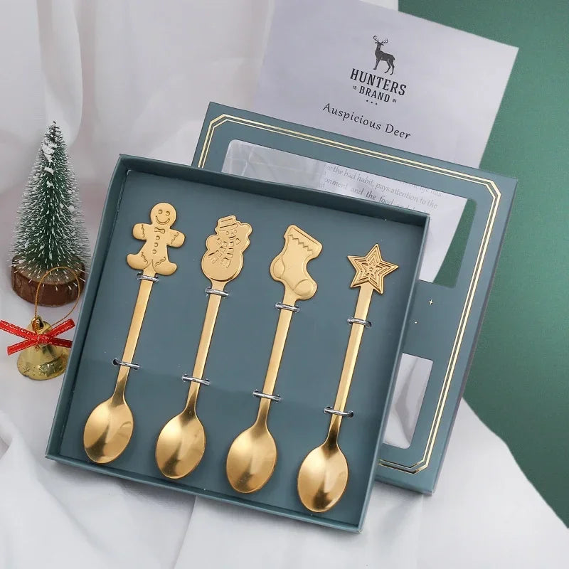 Set of gold Christmas-themed spoons in a box with 'Hunters Brand' packaging.