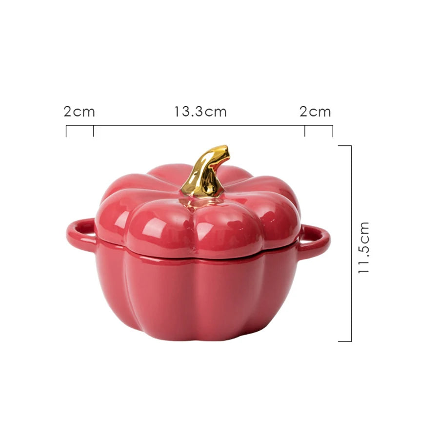 Red pumpkin-shaped pot with a gold handle, shown with dimensions on a white background.