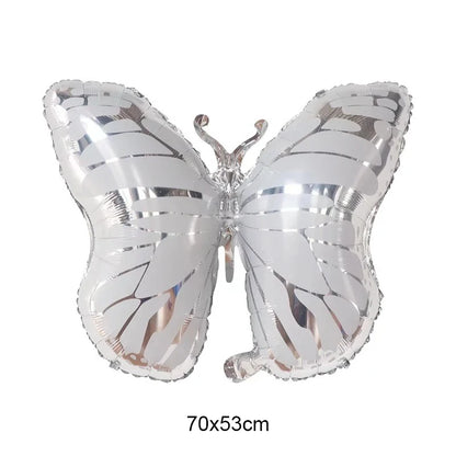 Silver butterfly-shaped foil balloon on a white background