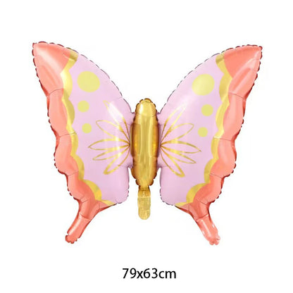 Butterfly-shaped balloon with pink and gold design on a white background