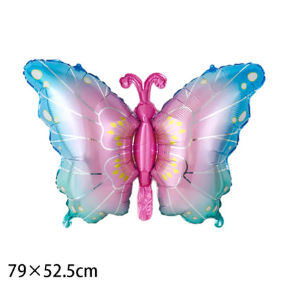 Butterfly-shaped balloon with pink and blue gradient on a white background