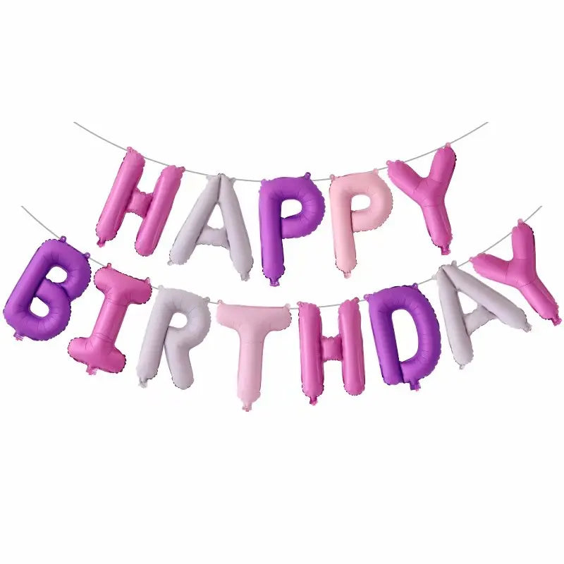 Pink and purple 'Happy Birthday' balloon banner on a white background