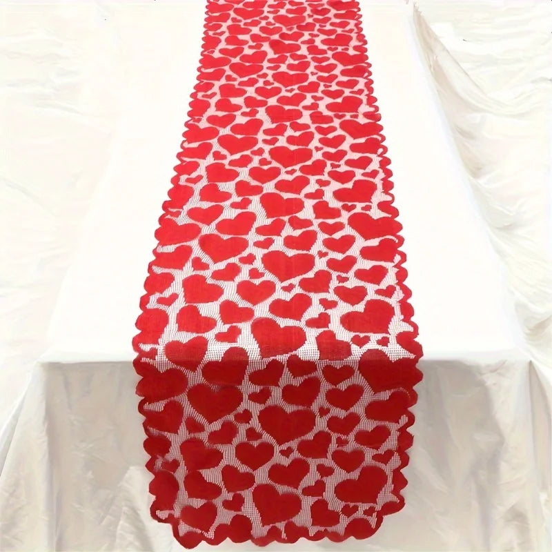 Red heart-patterned table runner on a white tablecloth
