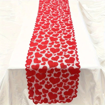 Red heart-patterned table runner on a white tablecloth
