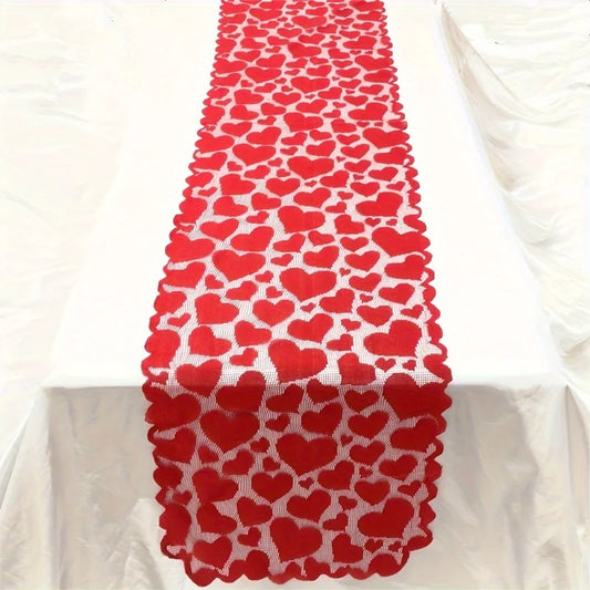 Red heart-patterned table runner on a white tablecloth