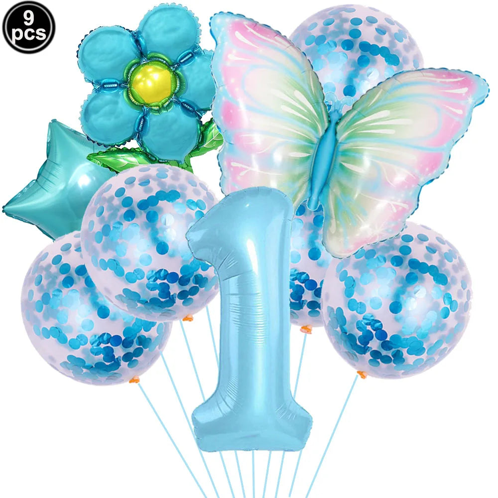 Set of blue balloons including a butterfly, flower, and number '1' on a white background.