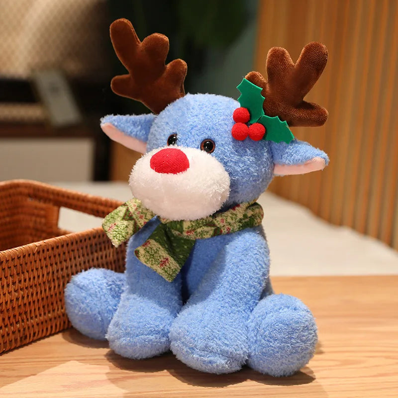 Blue stuffed reindeer toy with a red nose and green antlers on a wooden surface.