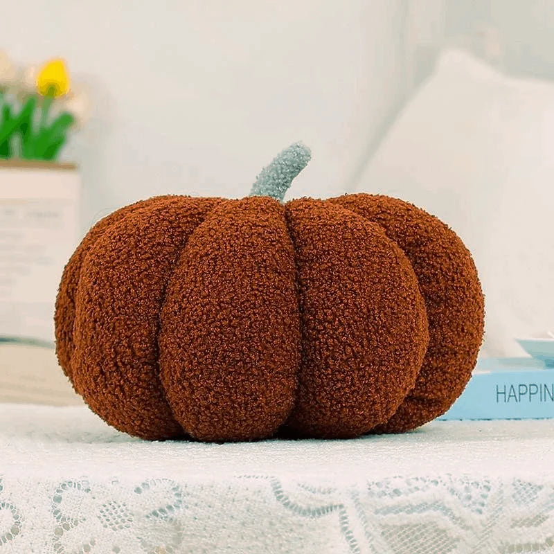 Brown textured pumpkin on a light surface with a blurred background