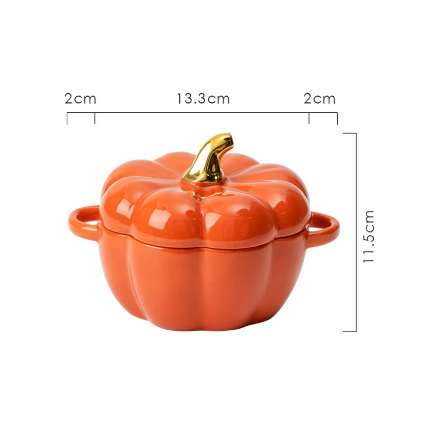 Orange pumpkin-shaped ceramic pot with gold lid knob, shown with dimensions on a white background.