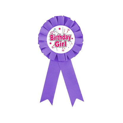 Purple ribbon with 'Birthday Girl' text on a white background