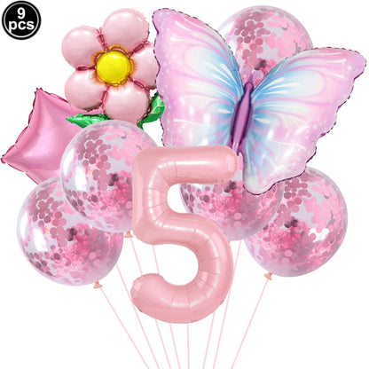 Set of pink balloons including a butterfly, flower, and number '5' on a white background